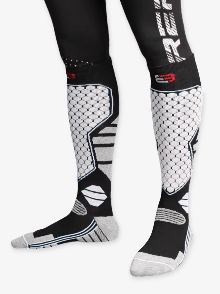 Men's thick knee-high ski socks with a honeycomb knit panel on the shin - black/white