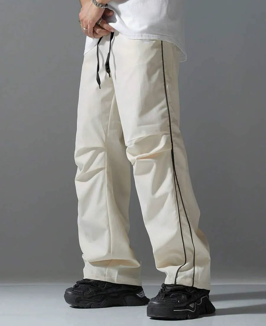 Men's relaxed tracksuit bottoms with side piping and a drawcord - ecru