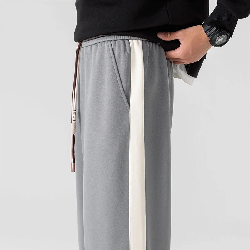 Men's wide-leg joggers with a wide contrast stripe along the outer seam and a drawcord - view 3