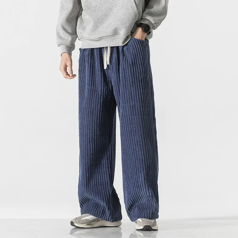 Men's wide-leg jumbo cord trousers with a drawcord waist and patch back pocket - navy