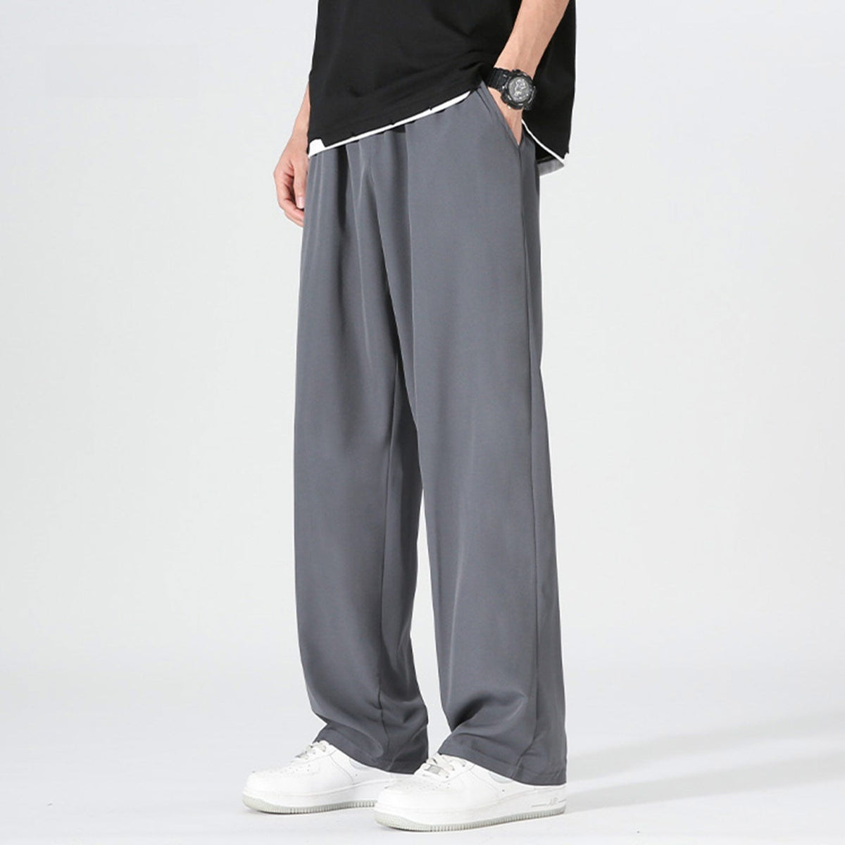 Men's wide-leg trousers with an elasticated waist and a pleat down the front of the leg - dark grey