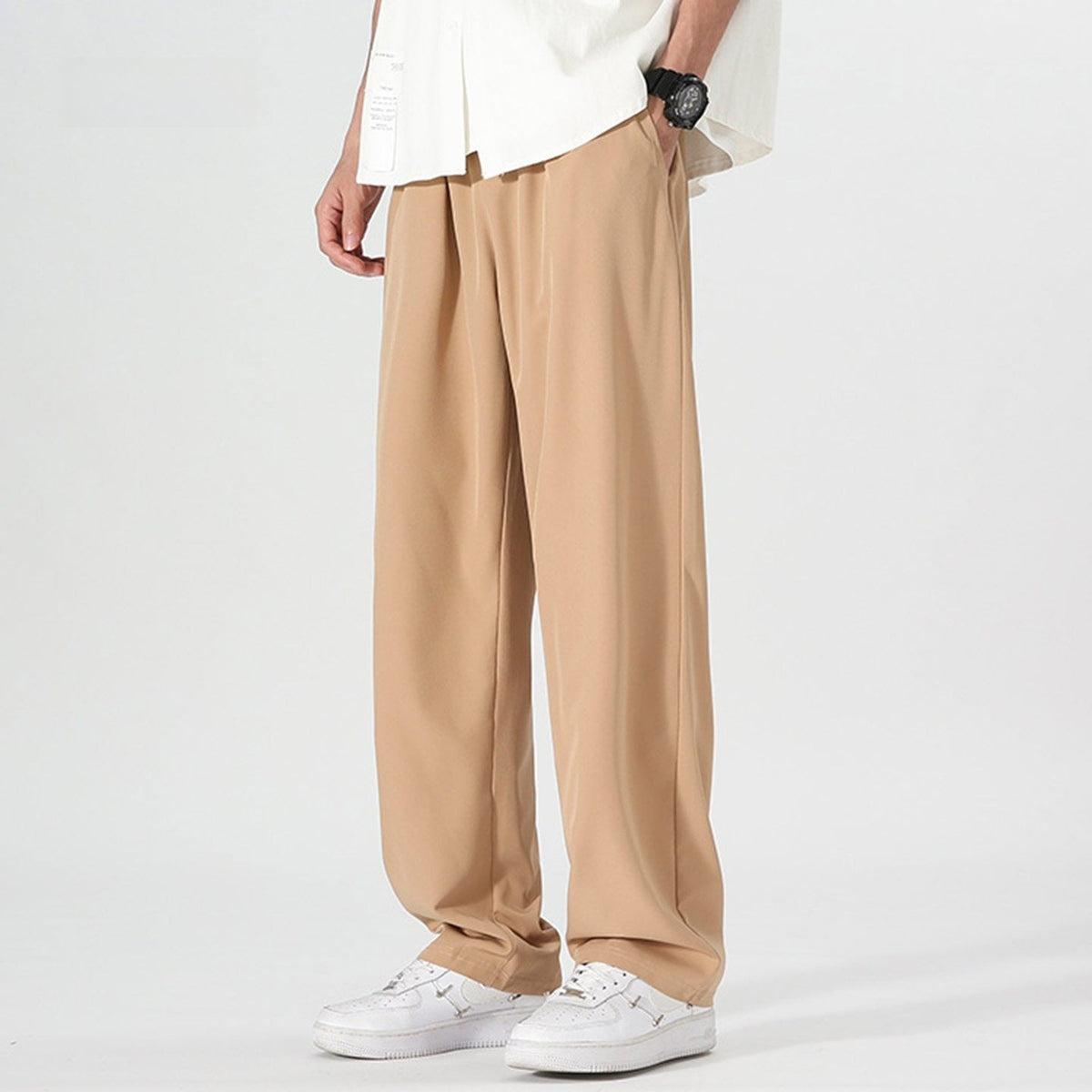 Men's wide-leg trousers with an elasticated waist and a pleat down the front of the leg - camel