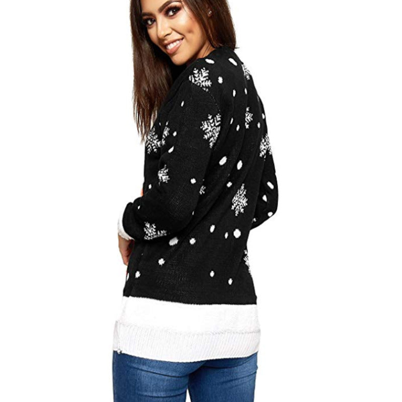 Women's knitted Christmas jumper with a Merry Christmas tree, star and pompoms