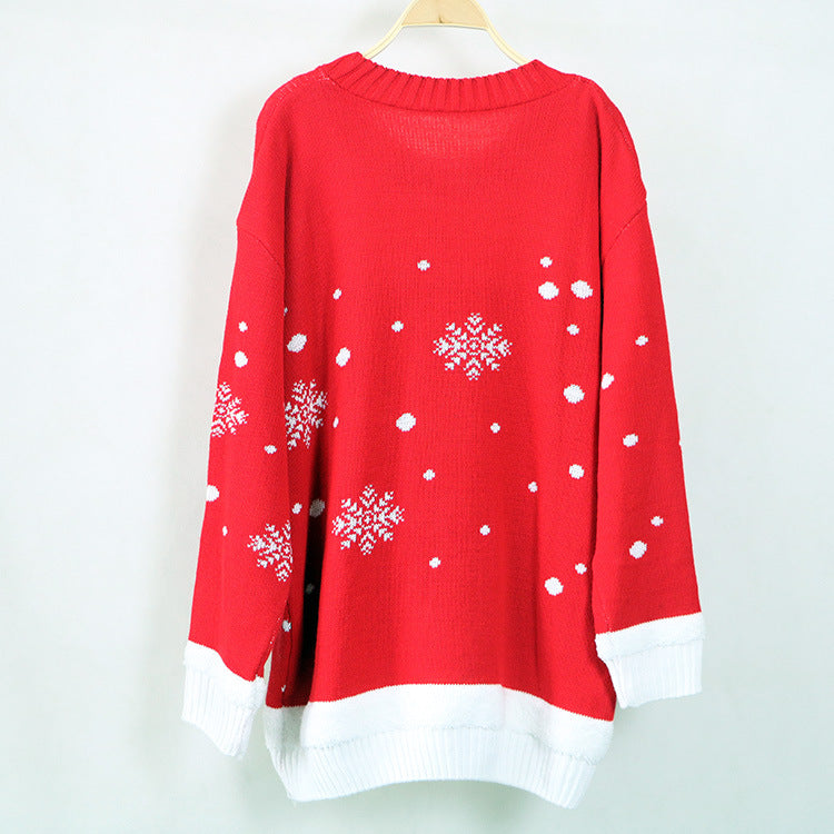 Women's knitted Christmas jumper with a Merry Christmas tree, star and pompoms