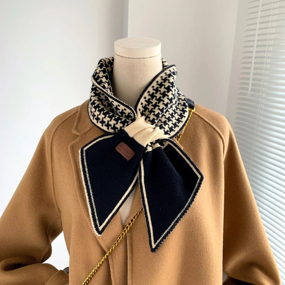 Women's narrow knitted scarf slipped through a small loop, with two plain pointed ends - small houndstooth