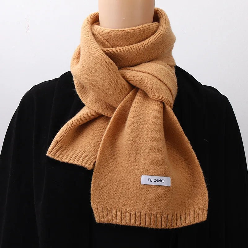 Women's narrow knitted scarf with ribbed ends and a small white label - camel