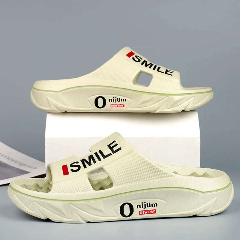 Sliders in EVA with a nubbed footbed, wide cut-out strap and thick sole - light green