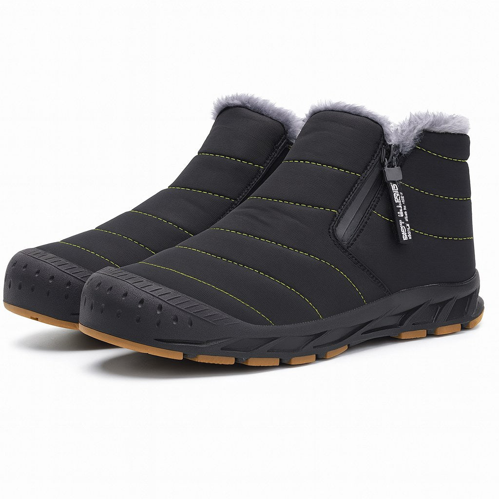 Unisex quilted ankle boots with a side zip and a gum tread sole in black