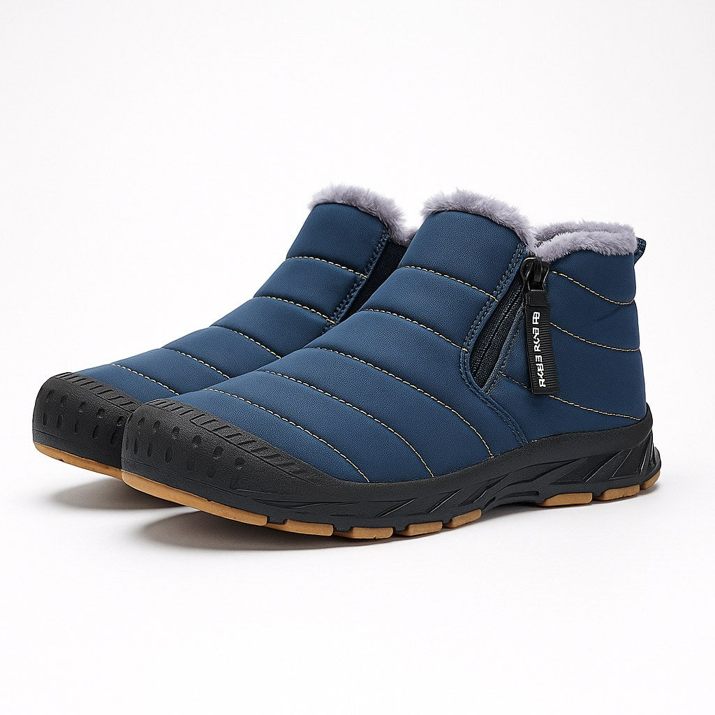 Unisex quilted ankle boots with a side zip and a gum tread sole in blue