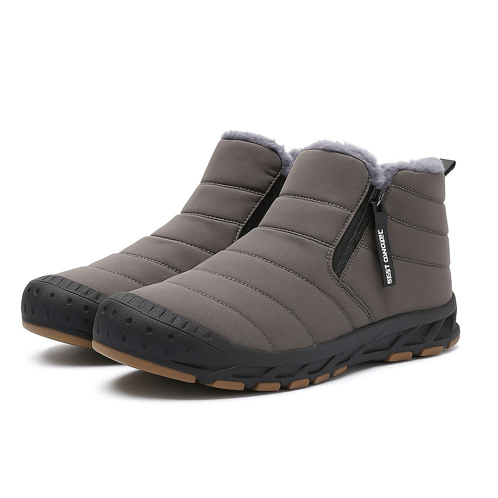 Unisex quilted ankle boots with a side zip and a gum tread sole in grey