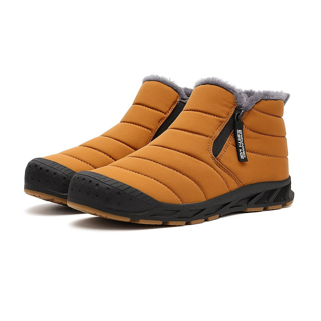 Unisex quilted ankle boots with a side zip and a gum tread sole in amber