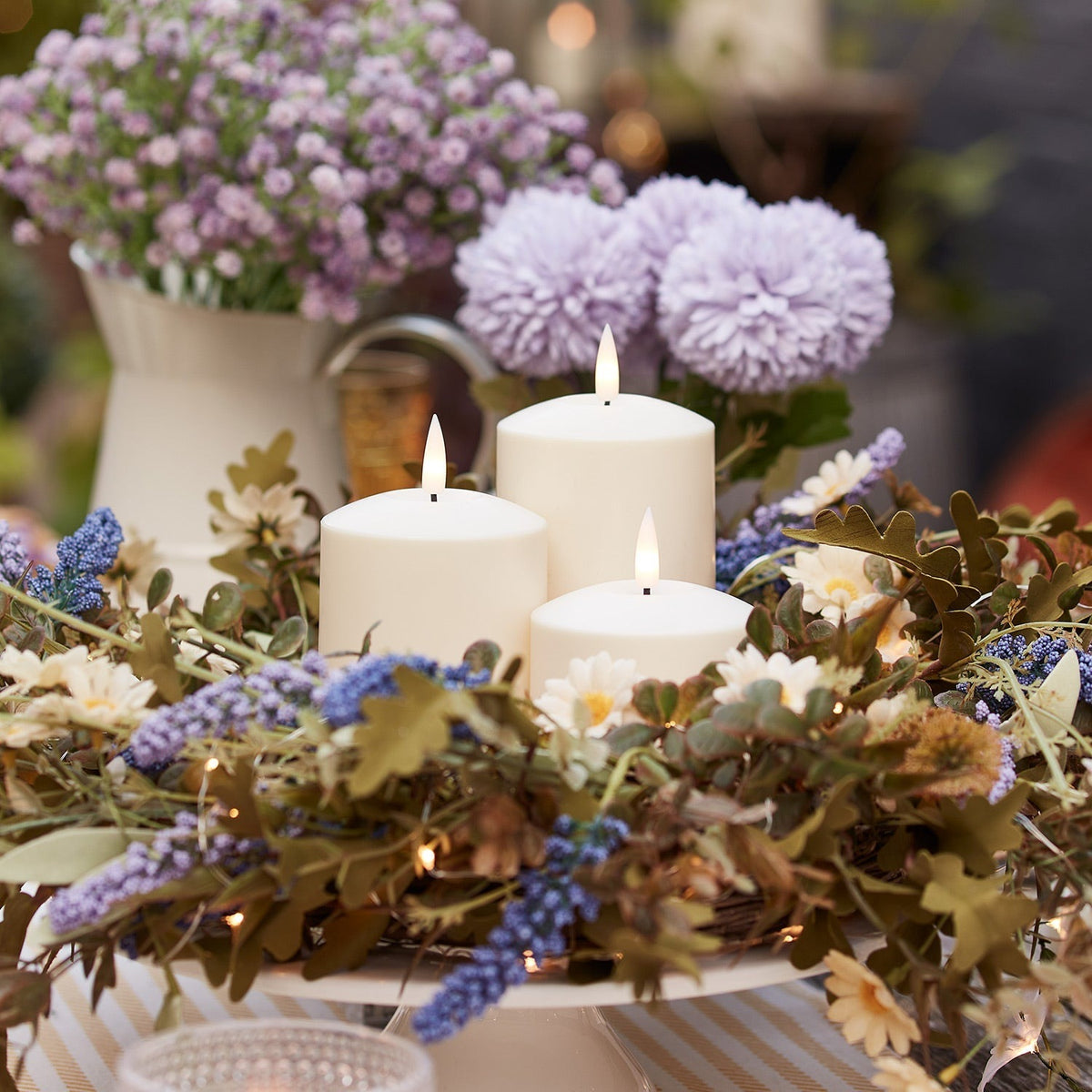 Three ivory outdoor LED candles with a flickering flame and timer - view 9