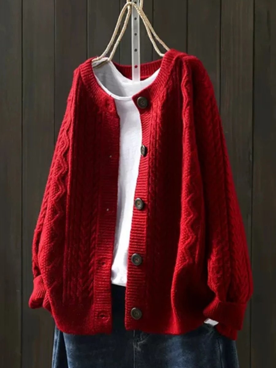 Women's oversized cable knit cardigan with a crew neck and button front - red