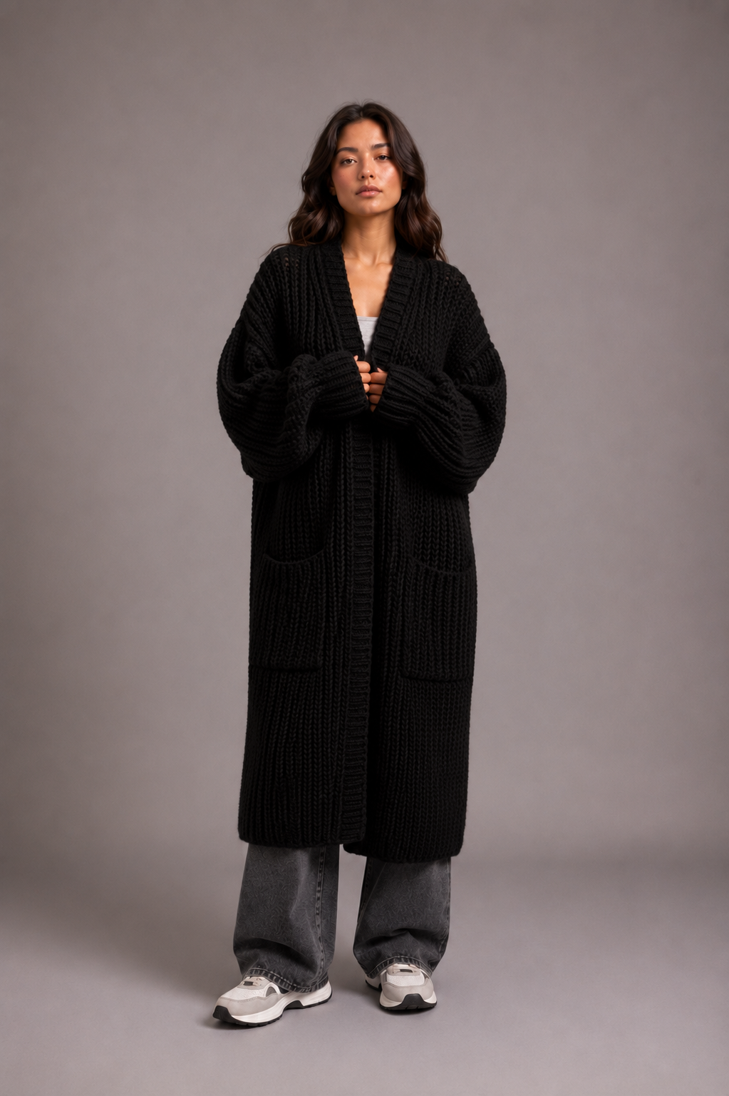 Women's oversized longline cardigan in a chunky knit with an open front and pockets
