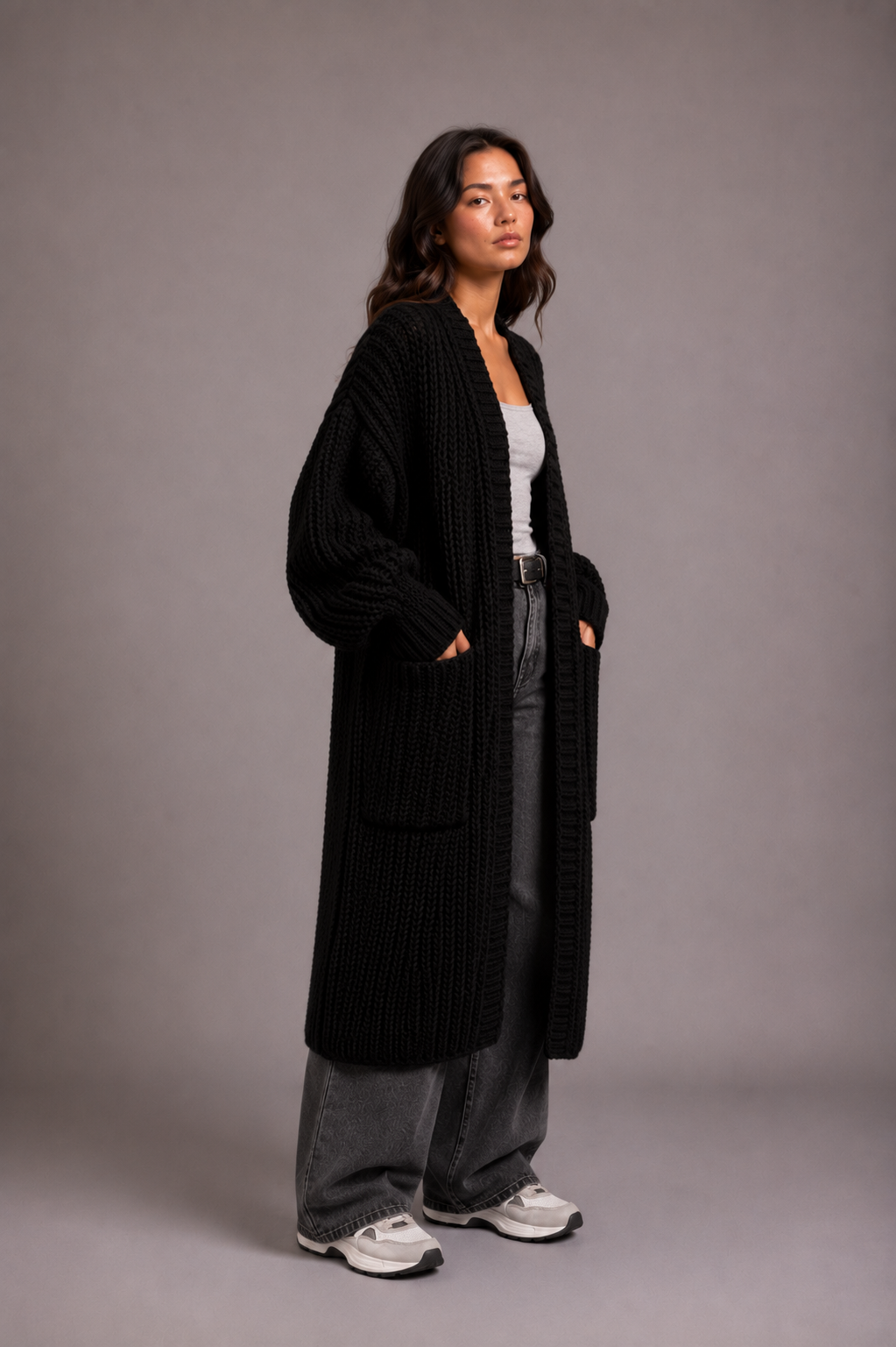 Women's oversized longline cardigan in a chunky knit with an open front and pockets