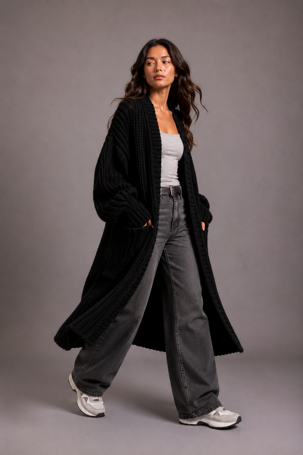 Women's oversized longline cardigan in a chunky knit with an open front and pockets