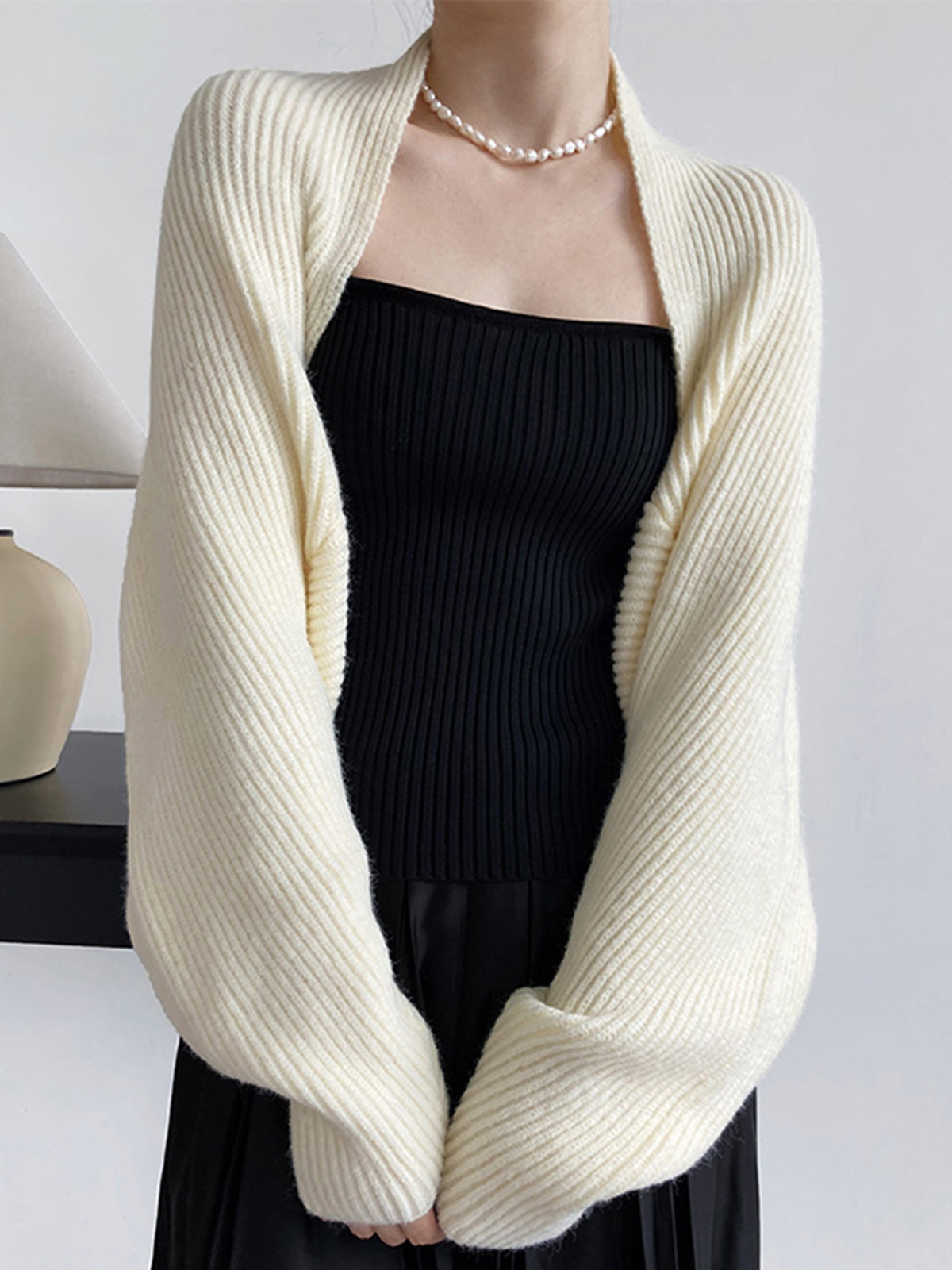 Women's oversized ribbed cardigan with balloon sleeves and a shawl collar - cream