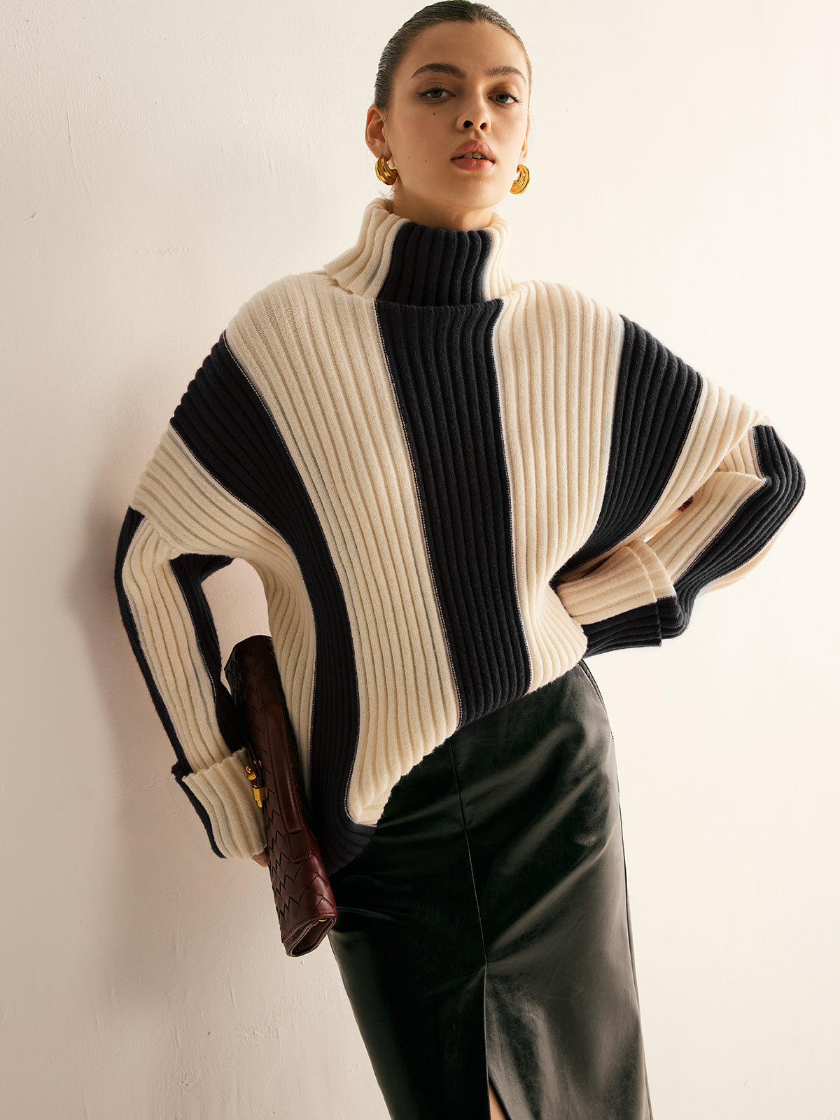 Women's oversized roll neck jumper with vertical colour blocks in chunky rib