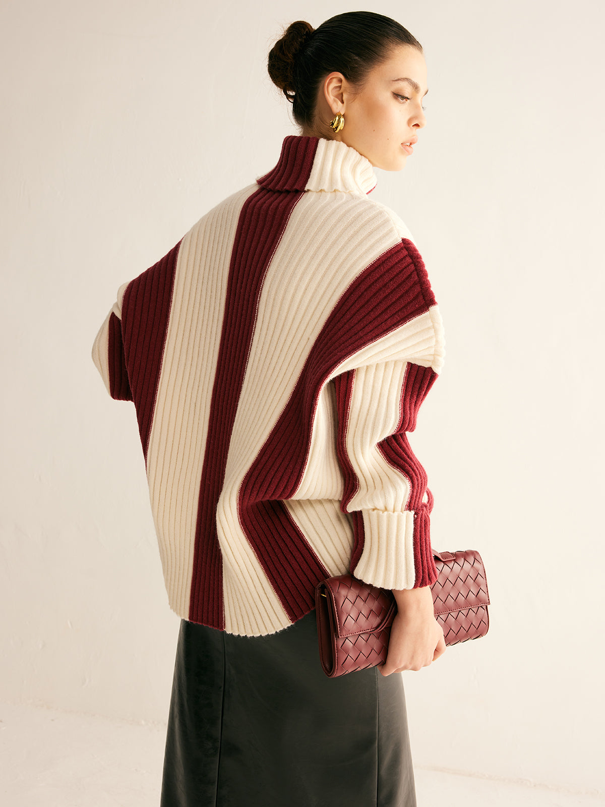 Women's oversized roll neck jumper with vertical colour blocks in chunky rib