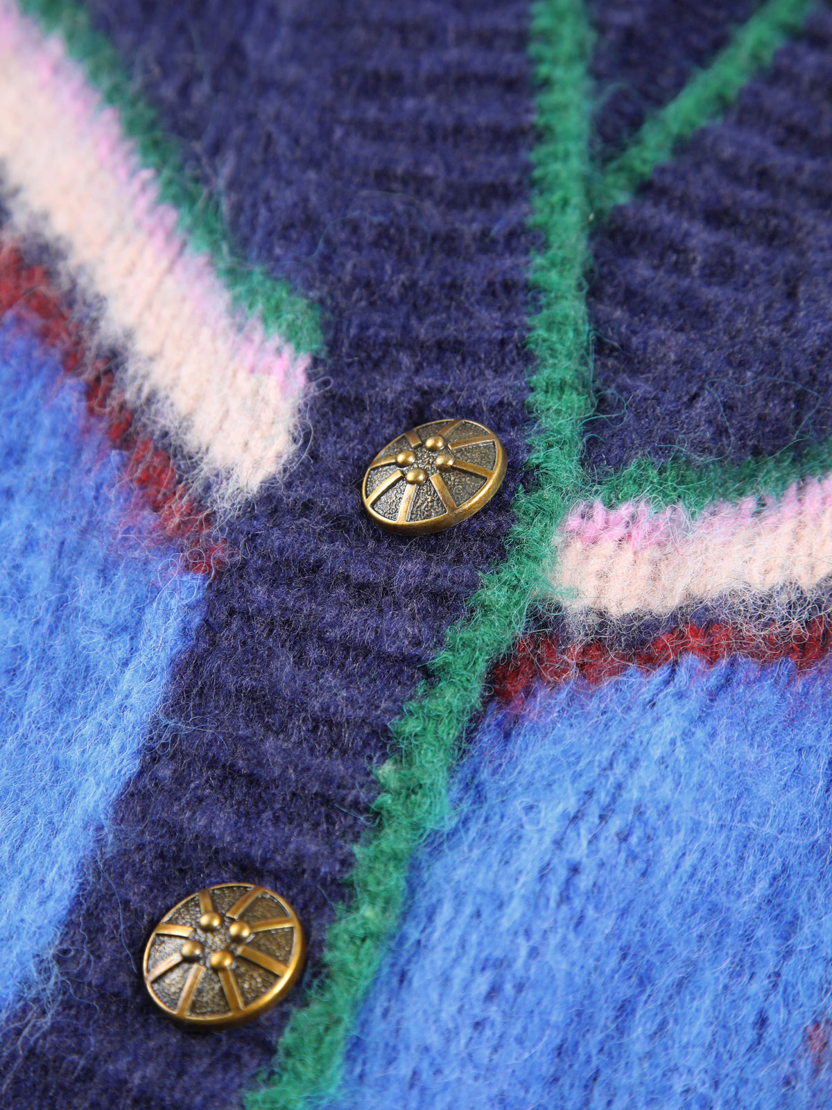 Women's oversized cardigan with a knitted star pattern, V-neck and patch pockets