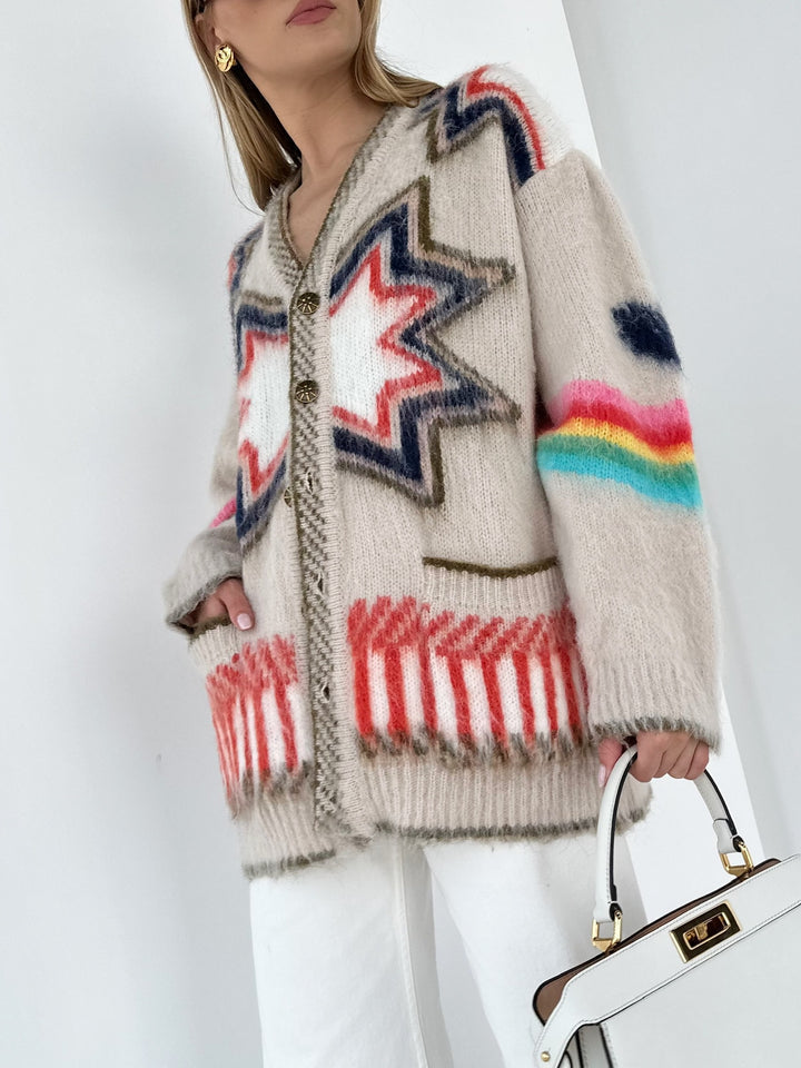Women's oversized cardigan with a knitted star pattern, V-neck and patch pockets