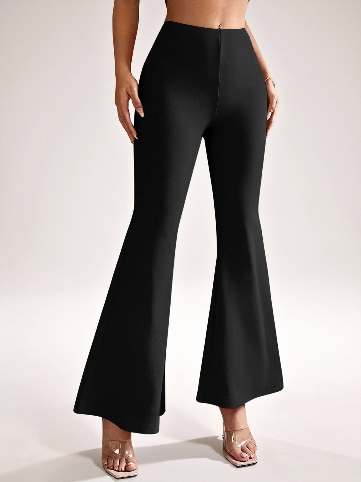 Petite flared trousers for women in stretch knit with an elastic waist - black
