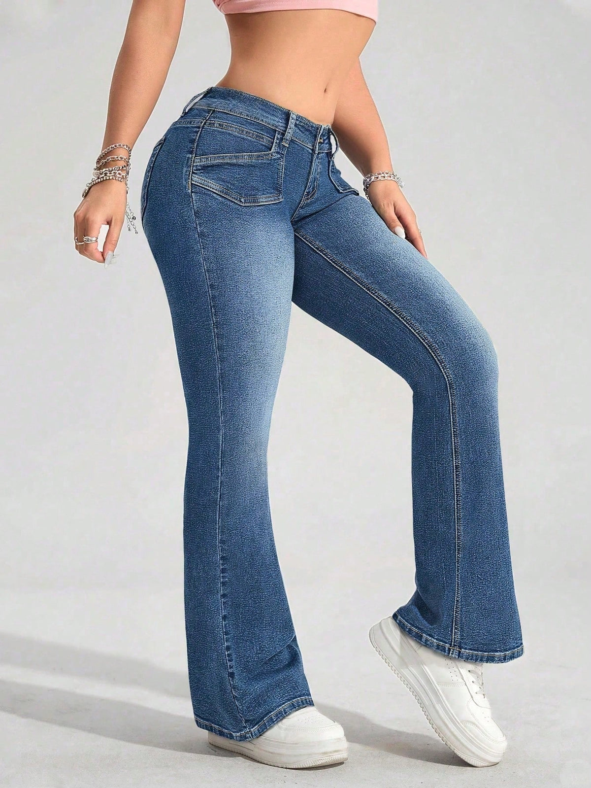 Petite low rise flared jeans for women with a leg that flares from the knee - view 9