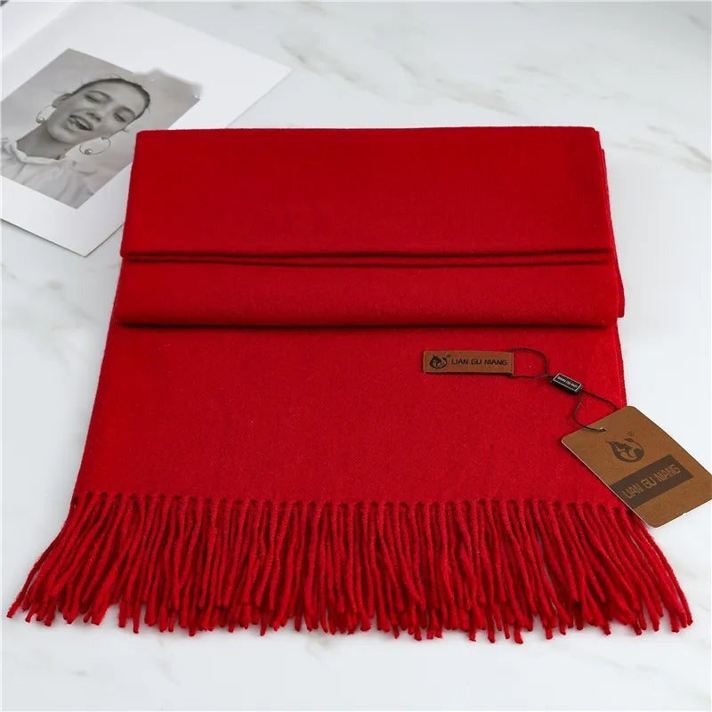 Women's plain woven scarf in a dense fabric with fringe at both ends - red