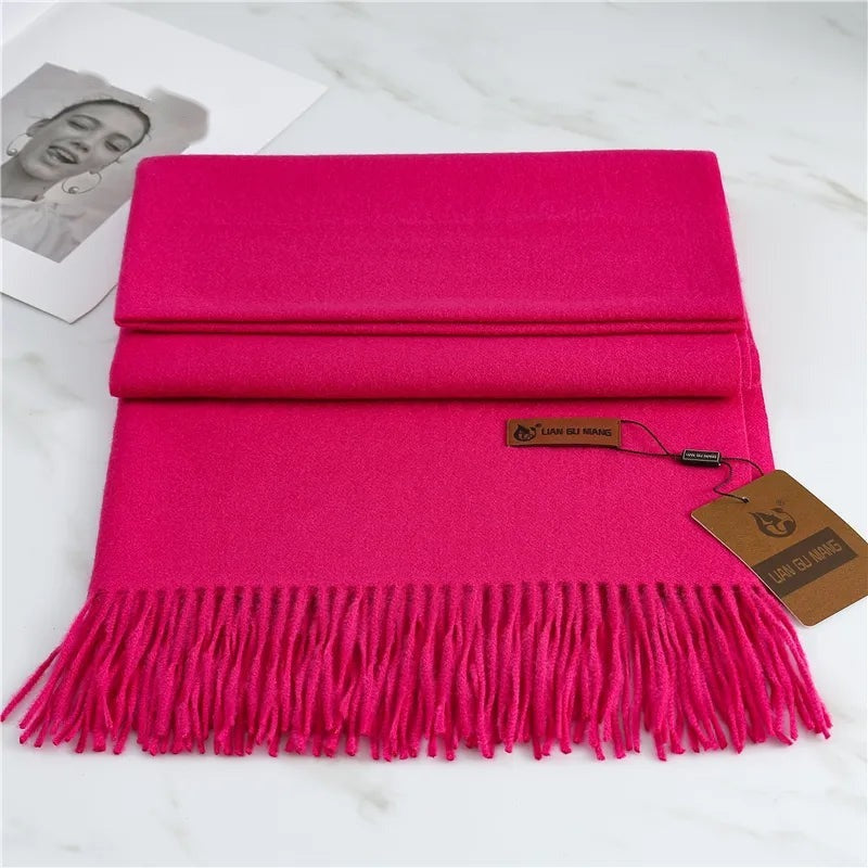 Women's plain woven scarf in a dense fabric with fringe at both ends - fuchsia