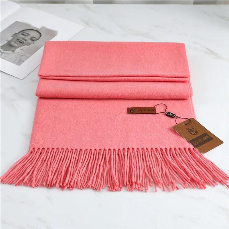 Women's plain woven scarf in a dense fabric with fringe at both ends - salmon pink