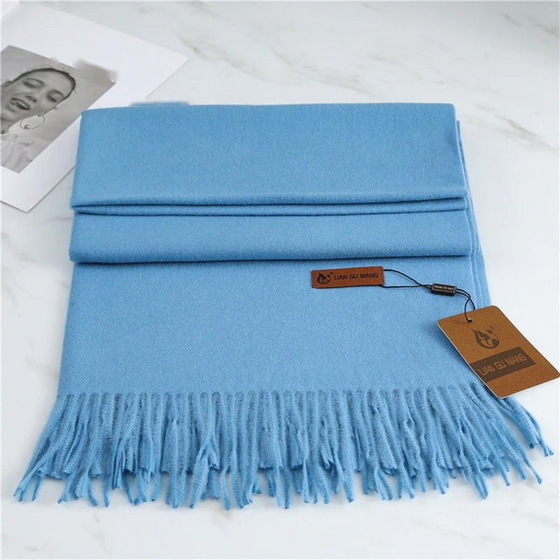 Women's plain woven scarf in a dense fabric with fringe at both ends - sky blue