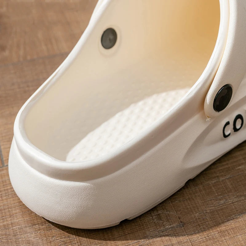 Clogs in EVA with a closed toe, vent holes, platform sole and heel strap - view 4