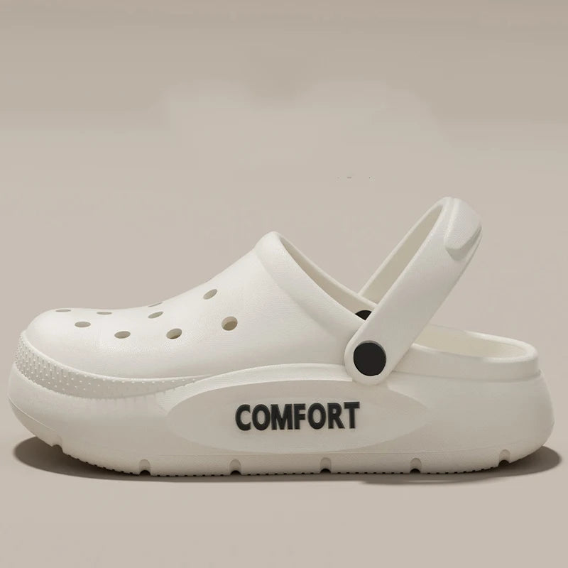 Clogs in EVA with a closed toe, vent holes, platform sole and heel strap - white