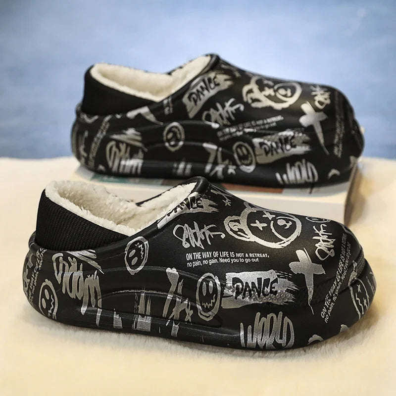 Platform slippers with an all-over graffiti print, plush lining and knitted heel collar