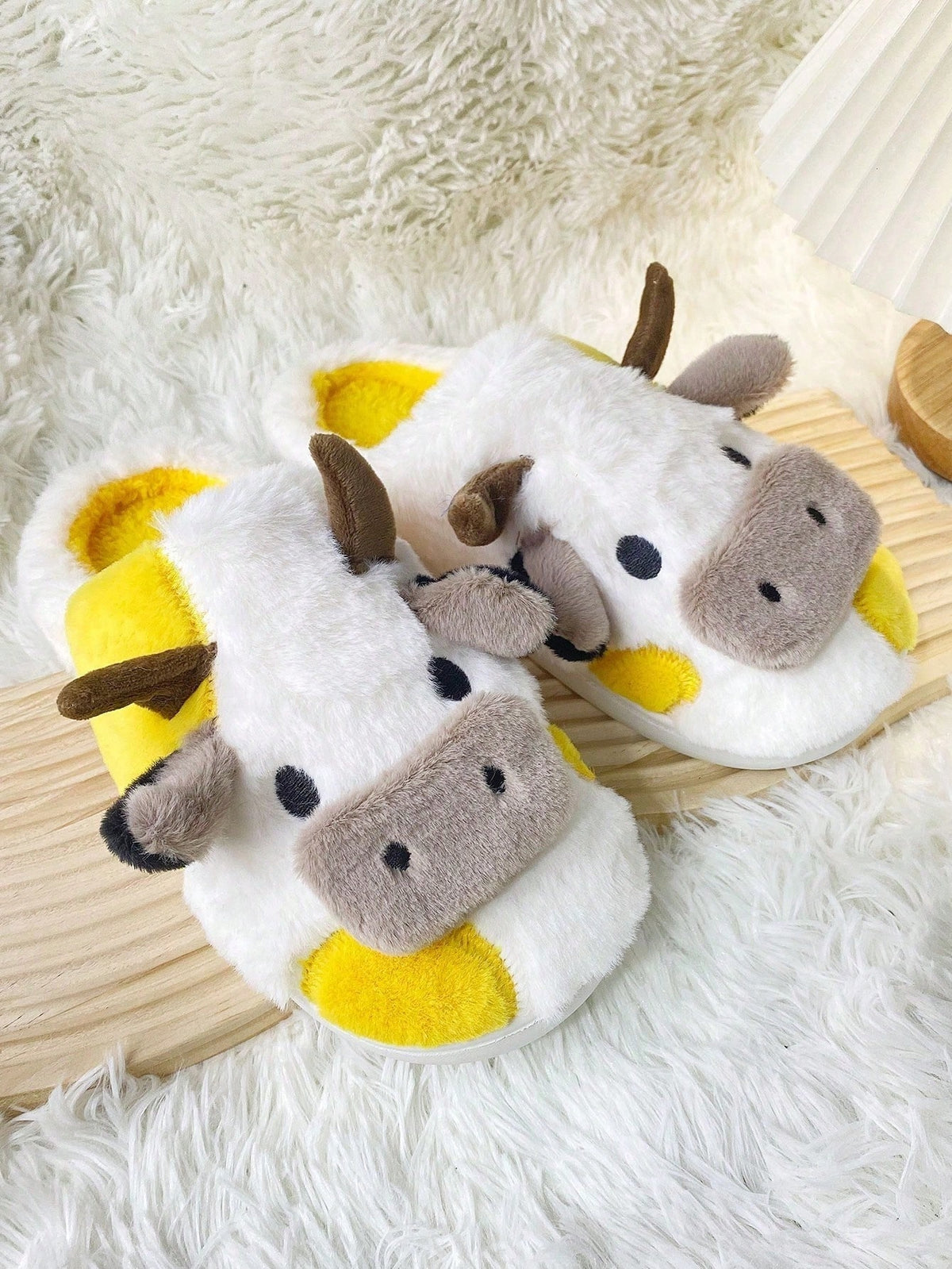 Plush cow slippers with little horns, ears and a snout on the toe and spots on the sides - view 8