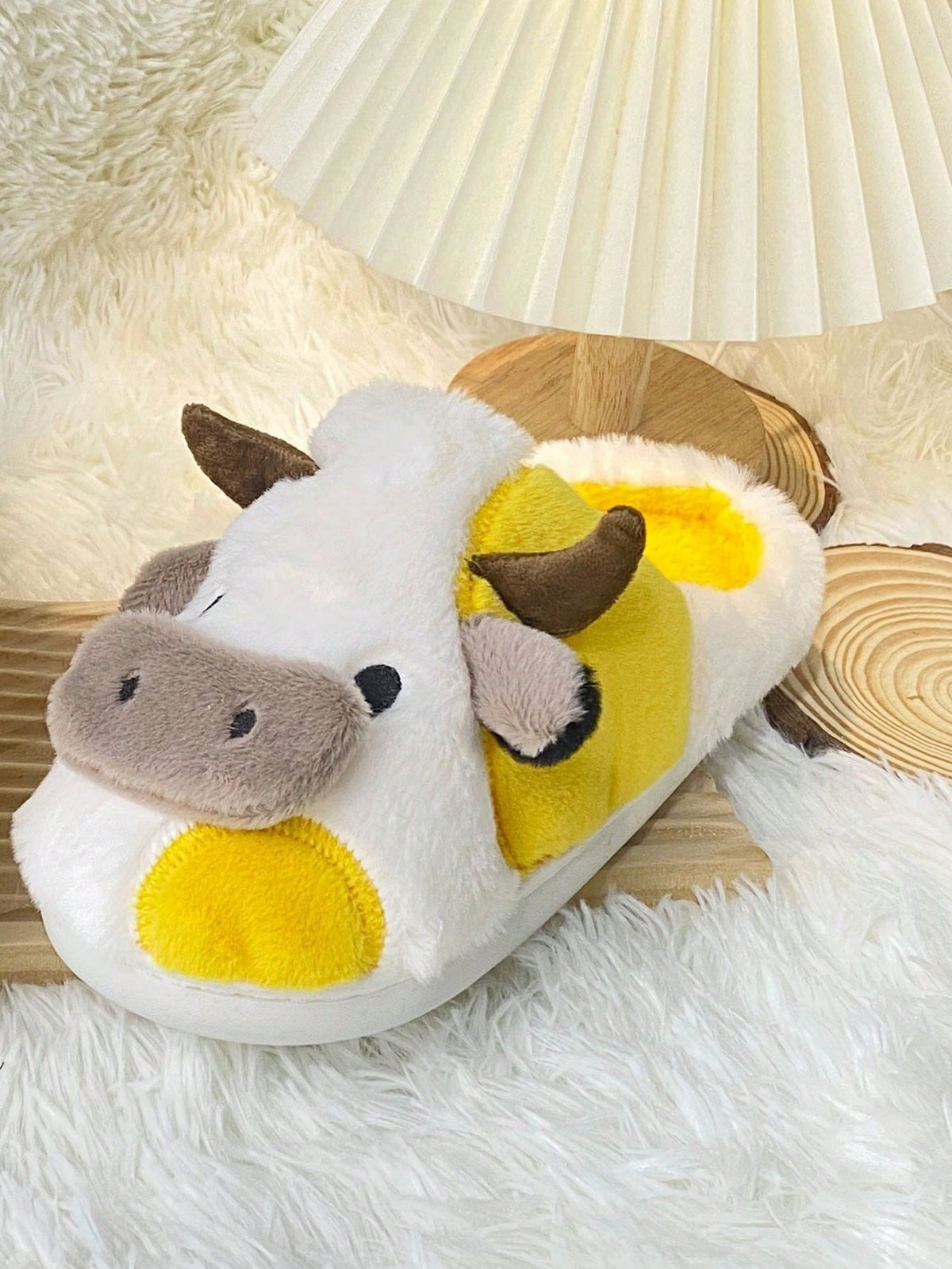 Plush cow slippers with little horns, ears and a snout on the toe and spots on the sides - view 9