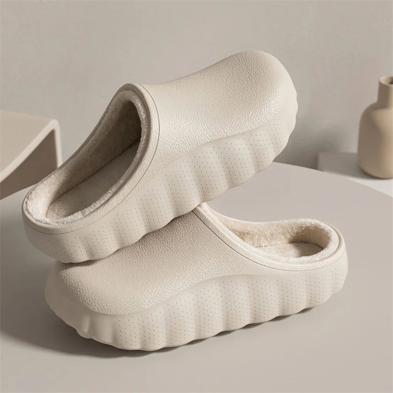 EVA slippers with a closed toe, open heel, plush lining and a wavy sole