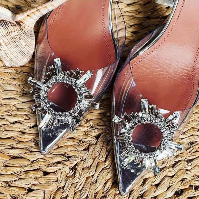 Women's crystal clear heels worn party look