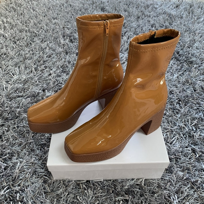 Women's faux leather ankle boots heel close up