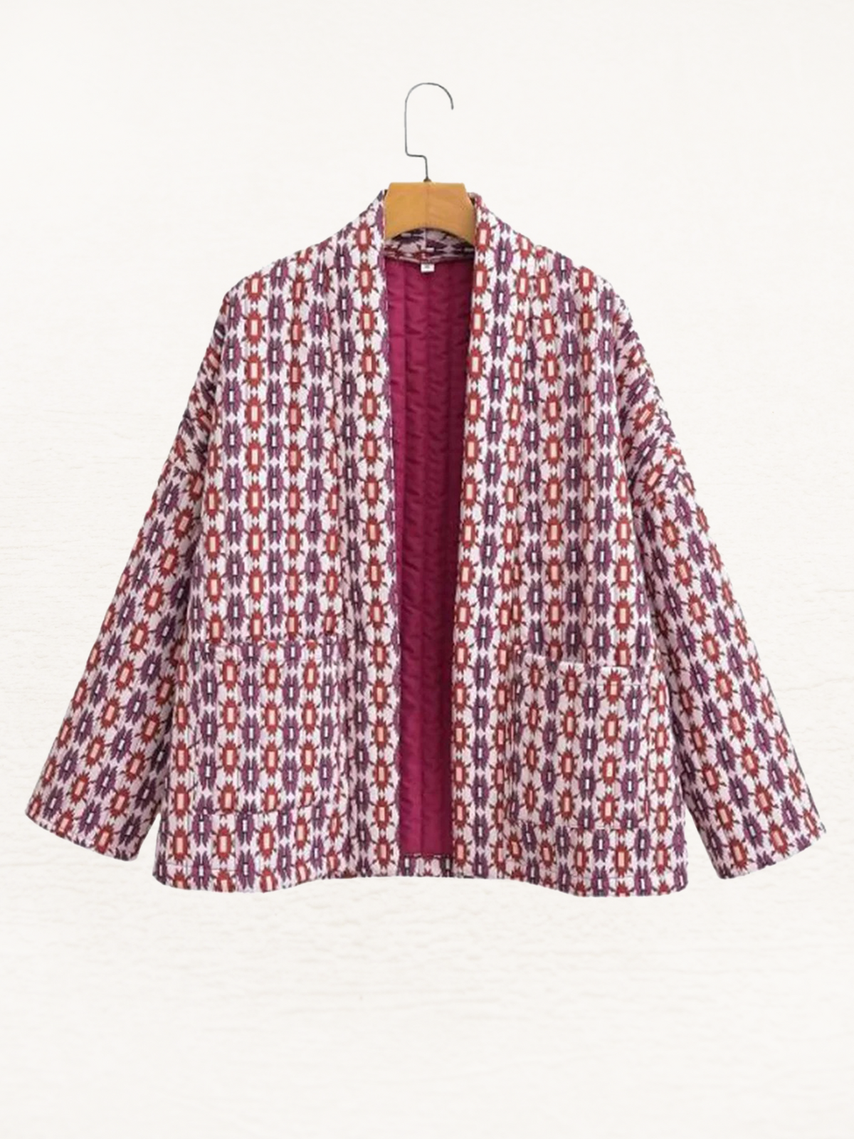 Women's quilted kimono jacket with a geometric print and an open front