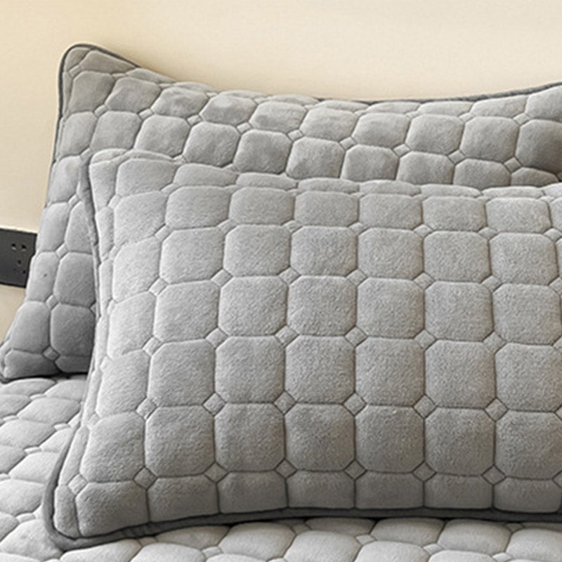 Quilted teddy bedspread with a square pattern on a double bed - view 2