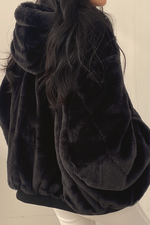 Women's reversible oversized bomber jacket with faux fur and a hood