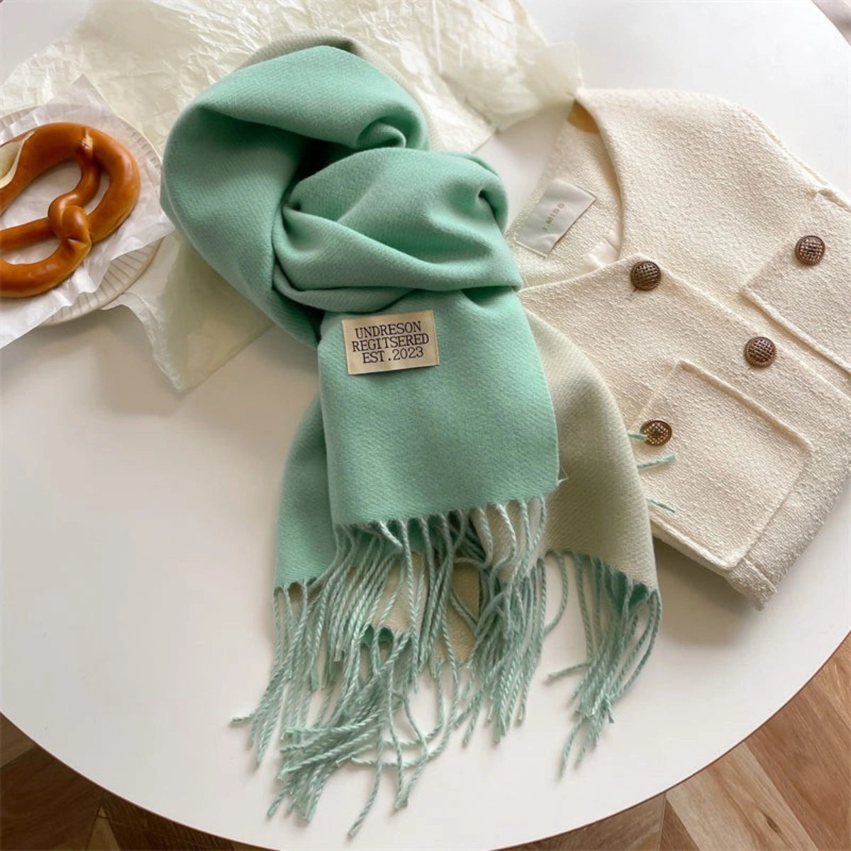 Women's reversible two-tone scarf with fringe and a small fabric label - mint green