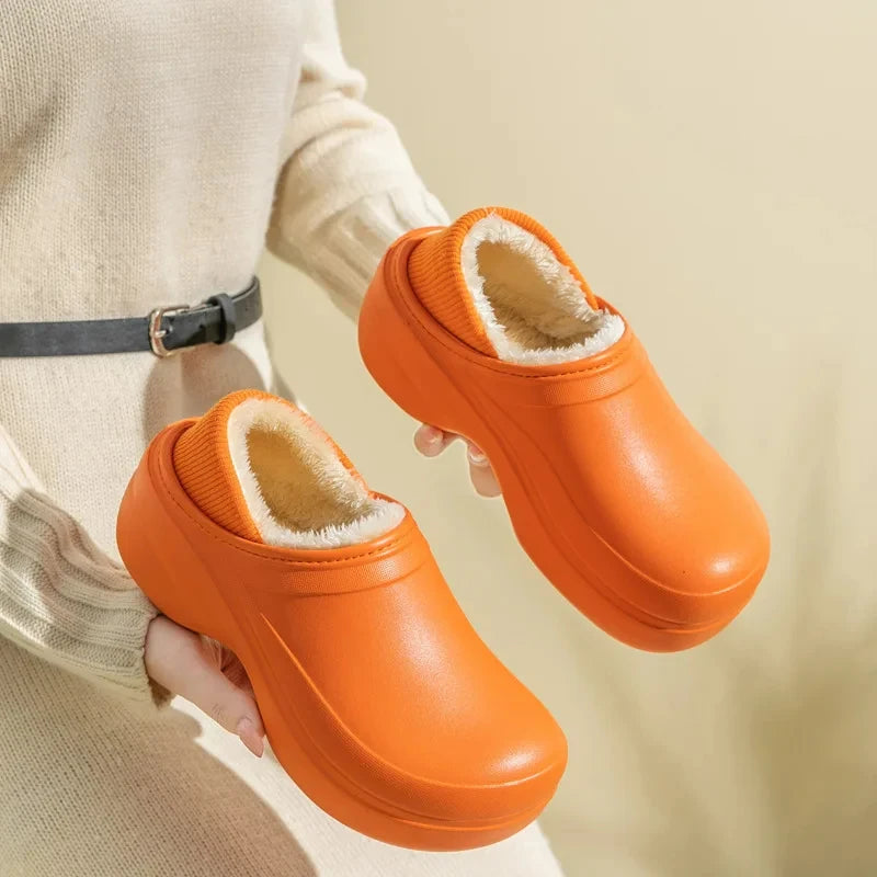 Platform slippers with water-repellent shell, plush lining and ribbed collar