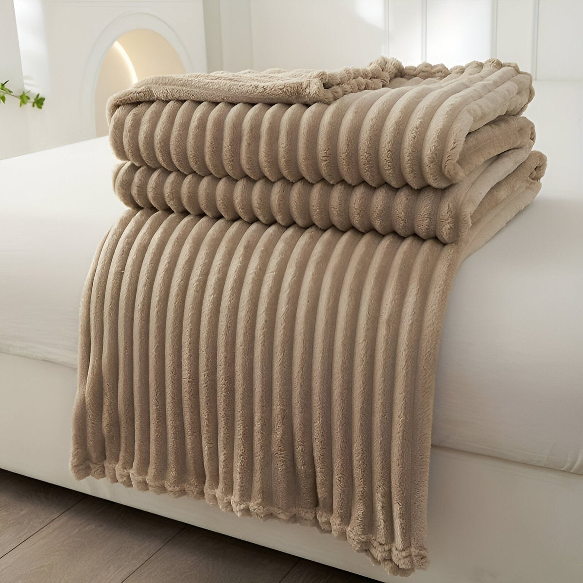 Fleece throw with a ribbed texture in soft plush - sand
