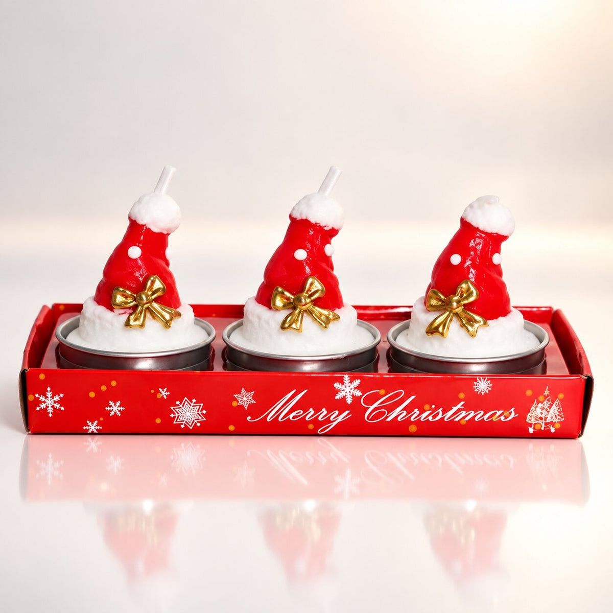 Three Santa Christmas tea lights in a red tray - santa hat