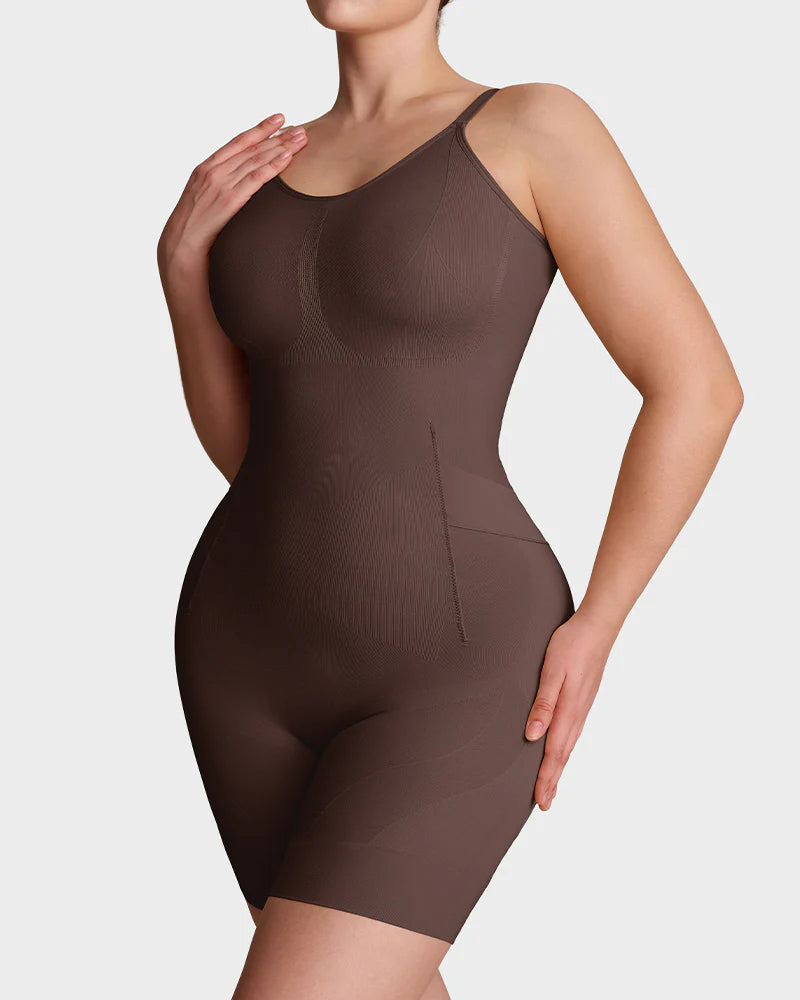 Seamless shapewear bodysuit with thin adjustable straps and legs to mid-thigh - mocha