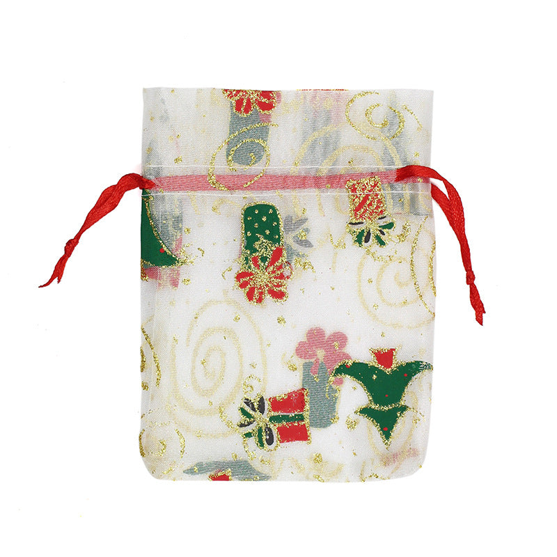 Sheer organza Christmas gift bags with red ribbon ties and festive print