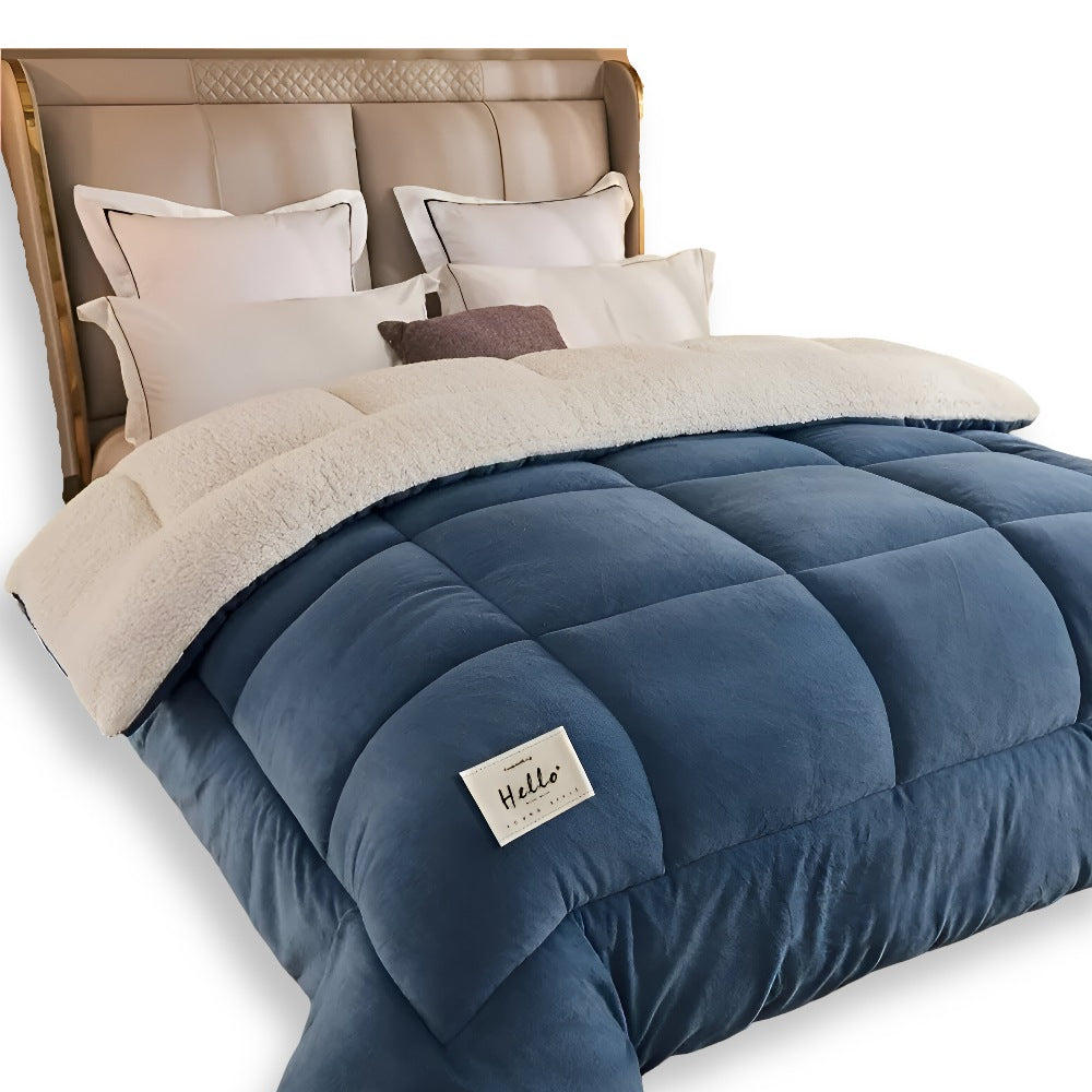 Thick sherpa duvet with a fleece top on a made bed - blue