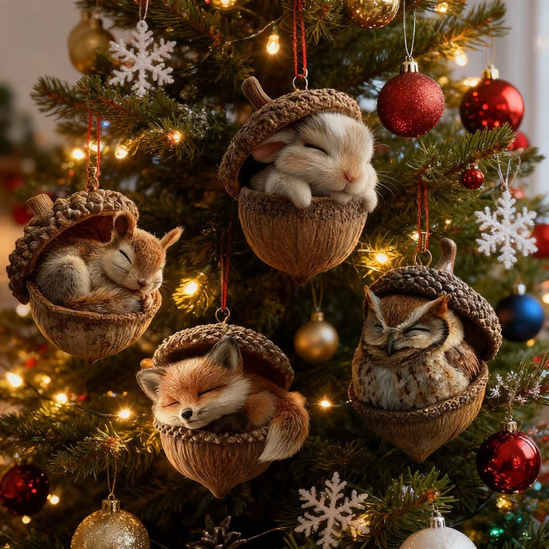 Flat acrylic Christmas ornament printed with a sleeping animal in an acorn, hanging on a tree